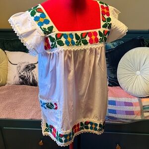 Vintage 1970s top with yarn embroidery and lace trim